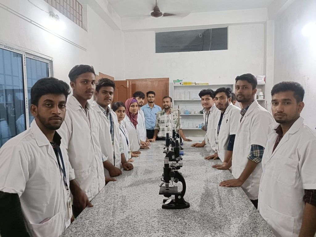 Students using microscopes in lab